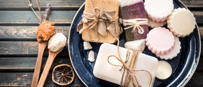 still life of spa with handmade soap on a beautiful wooden background, concept of spa relaxation and wellness procedures